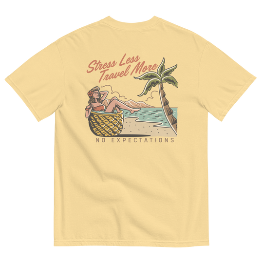 Soft and Durable Comfort Colors short sleeve t-shirt featuring a 'Stress Less - Travel More' design with a Pineapple Girl graphic, part of the No Expectations brand collection Butter