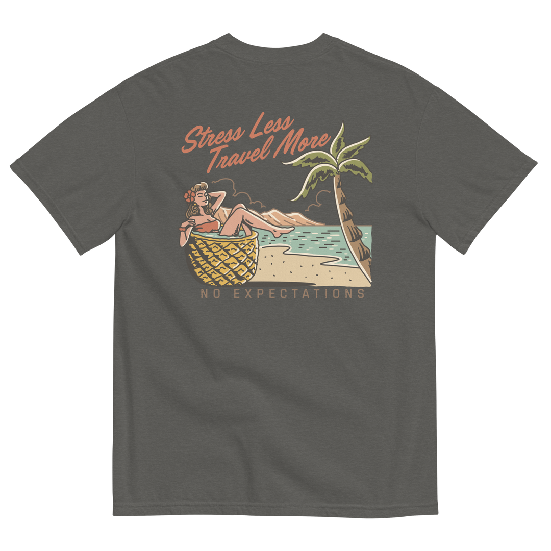 Soft and Durable Comfort Colors short sleeve t-shirt featuring a 'Stress Less - Travel More' design with a Pineapple Girl graphic, part of the No Expectations brand collection Pepper