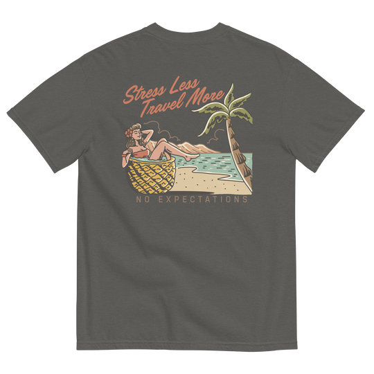 Soft and Durable Comfort Colors short sleeve t-shirt featuring a 'Stress Less - Travel More' design with a Pineapple Girl graphic, part of the No Expectations brand collection Pepper